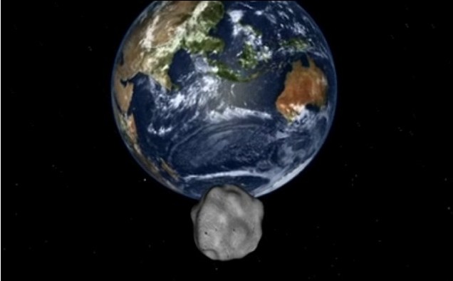 模拟图:小行星2012DA14于北京时间16日凌晨在印度尼西亚上方距离地球约2.76万公里的地方飞过。